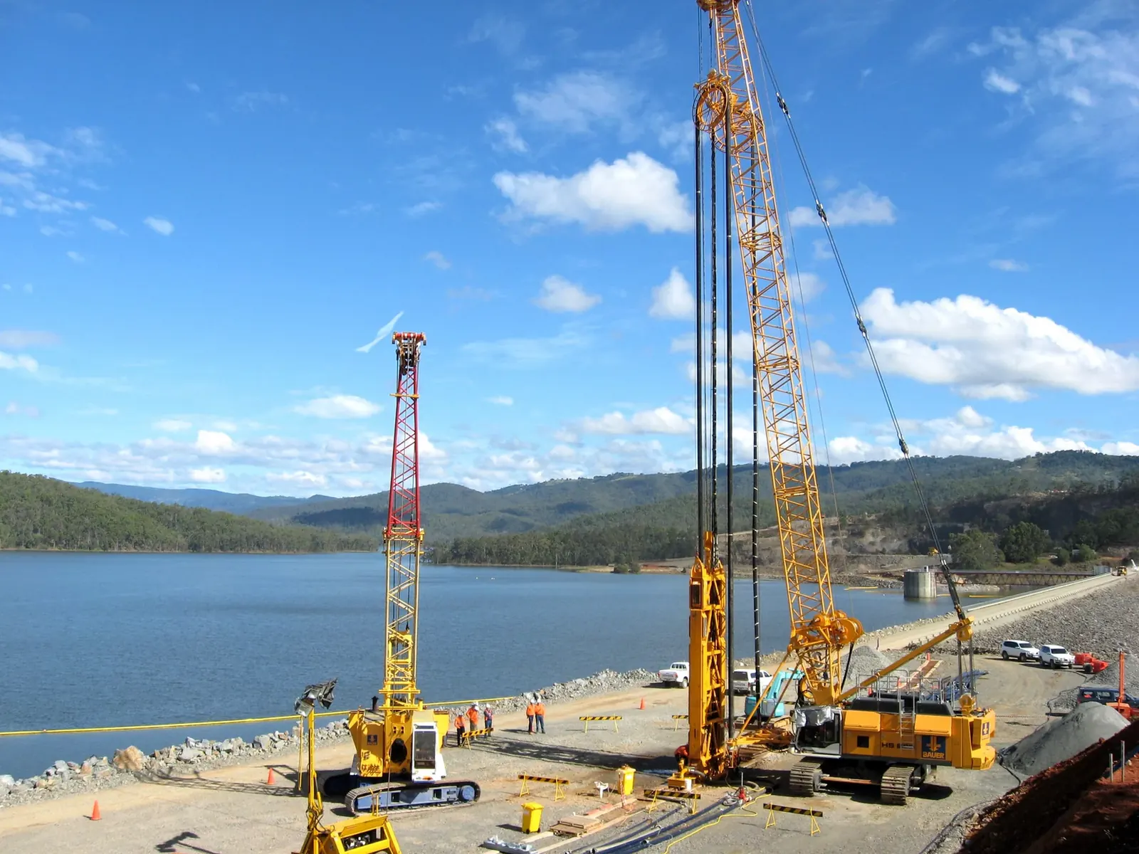 Piling and drilling rigs at a dam construction site